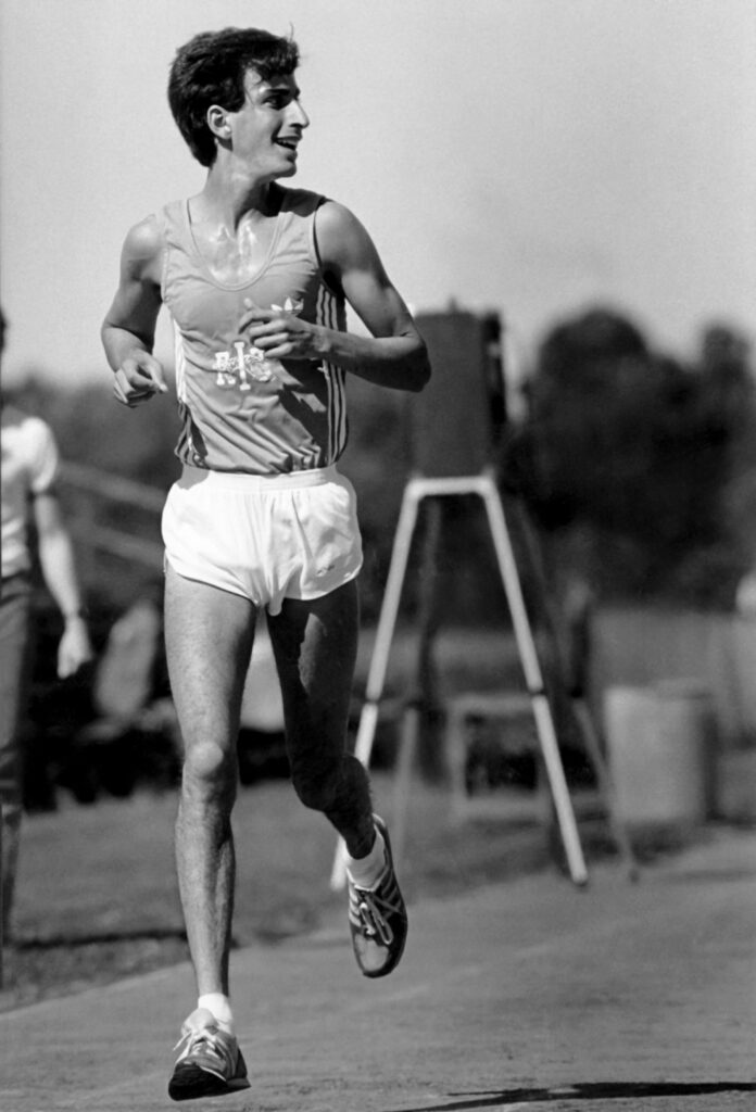 Paul Ruston running long distance on a track